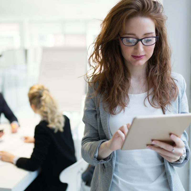 elegant-smart-businesswoman-in-company-office.jpg